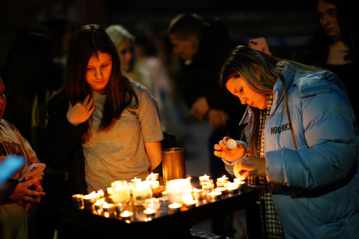 People take part in a vigil near to the scene in south Bristol where two teenage boys, aged 15 and 16, died after a stabbing attack by a group of people who fled the scene in a car. Picture date: Sunday January 28, 2024.