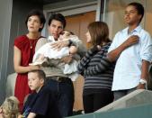 The two often had outings with Cruise's kids with ex-wife Nicole Kidman and Victoria and David Beckham's family. They got together to watch a soccer match in May 2008.