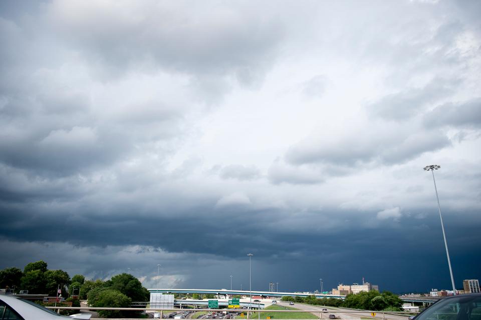 Storm clouds hover to the east as seen from Western Avenue as a tornado warning went into effect in June 2019 in Knoxville. Don't ignore warnings: Knoxville can get tornadoes at any time of year.