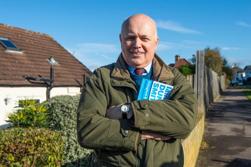 Iain Duncan Smith prepares by doing press-ups. (Lucy Young)