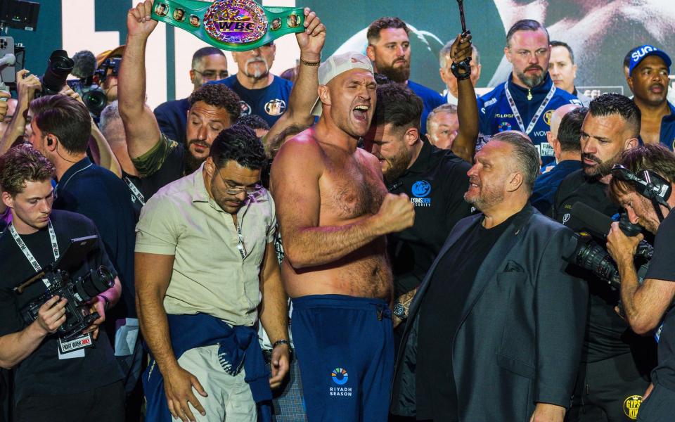Britain's Tyson Fury reacts on stage during his official weigh-in in Riyadh on May 17, 2024, on the eve of his heavyweight world boxing championship fight against Ukraine's Oleksandr Usyk
