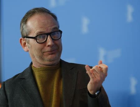 Director Etienne Comar poses during a photocall to promote the movie 'Django' at the upcoming 67th Berlinale International Film Festival in Berlin, Germany, February 9, 2017. REUTERS/Axel Schmidt