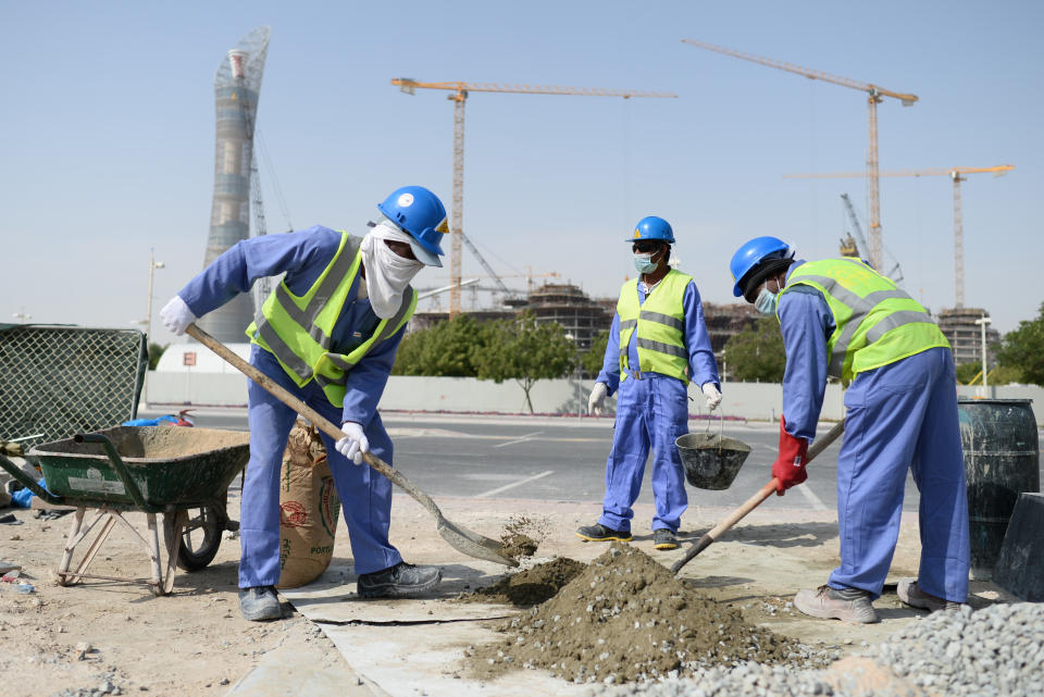 Doha migrant workers ahead of the Qatar World Cup 2022.  (Andreas Gebert / Picture Alliance via Getty Images file)