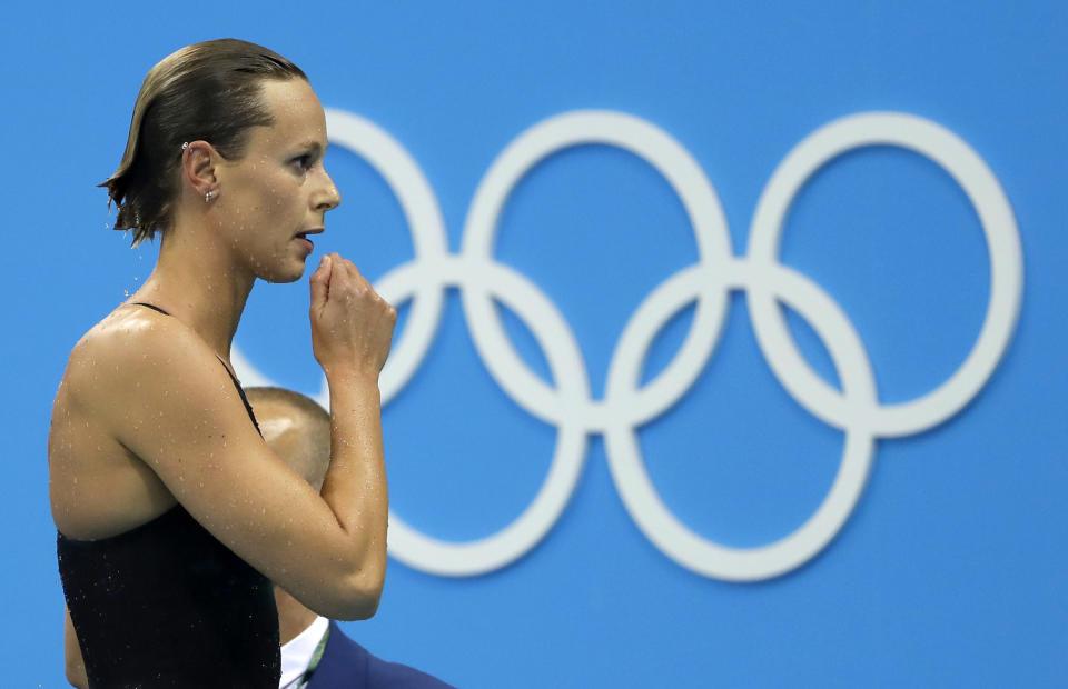 FILE - In this Aug. 8, 2016 file photo, Italy's Federica Pellegrini checks her time after placing third in a semifinal of the women's 200-meter freestyle during the swimming competitions at the 2016 Summer Olympics, in Rio de Janeiro, Brazil. The International Olympic Committee is slated in January 2021 to consider imposing a humiliating probation on Italy’s team for the Tokyo Games due to a two-year domestic dispute that it says amounts to government interference. (AP Photo/Matt Slocum, file)