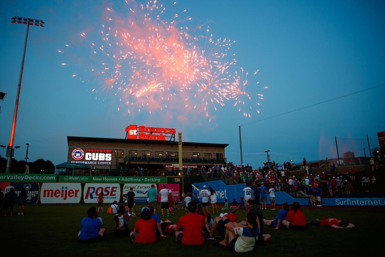 Fans watch a fireworks show after a minor league baseball game between the South Bend Cubs and the Lake County Captains at Four Winds Field on Friday, June 21, 2024, in South Bend.