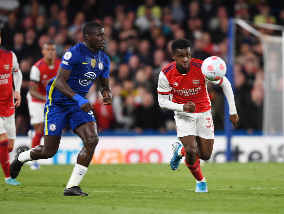 LONDON, ENGLAND - APRIL 20: Eddie Nketiah of Arsenal breaks past Malang Sarr of Chelsea during the Premier League match between Chelsea and Arsenal at Stamford Bridge on April 20, 2022 in London, England. (Photo by Stuart MacFarlane/Arsenal FC via Getty Images)