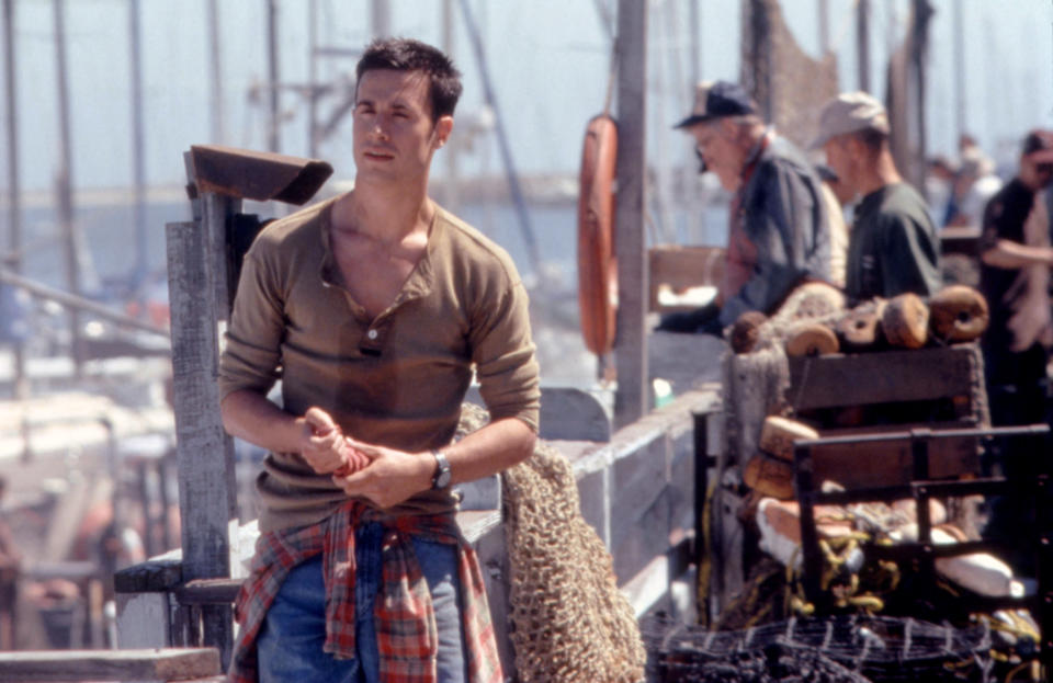 Freddie on a dock in the movie