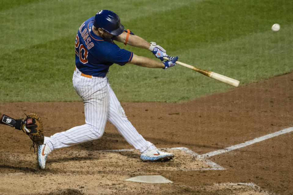 New York Mets' Pete Alonso (20) hits a two-run home run during the sixth inning of a baseball game against the Washington Nationals Wednesday, Aug. 12, 2020, in New York. (AP Photo/Frank Franklin II)