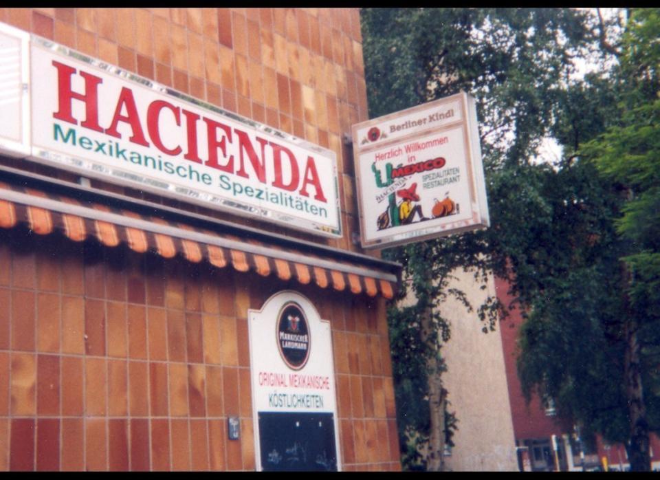 Ich bin ein burrito. Tex-Mex restaurant in Berlin, 1999. Many German-Mexican restaurants were notable for their vegetarian emphasis, perhaps catering to members of the German counterculture who had sampled Mexican food while backpacking along the Maya trail. Even the beef tostadas were served atop a pyramid of salad greens.