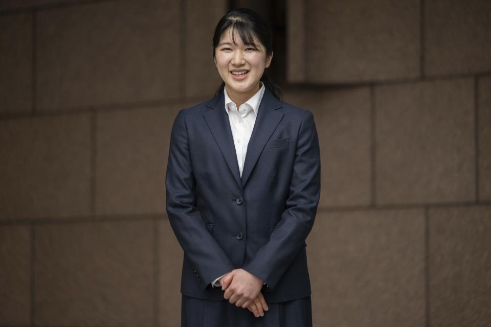 Japan's Princess Aiko, the daughter of Emperor Naruhito and Empress Masako, poses for the media at the Japanese Red Cross Society as she begins to work on April 1, 2024. (Yuichi Yamazaki/Pool Photo via AP)