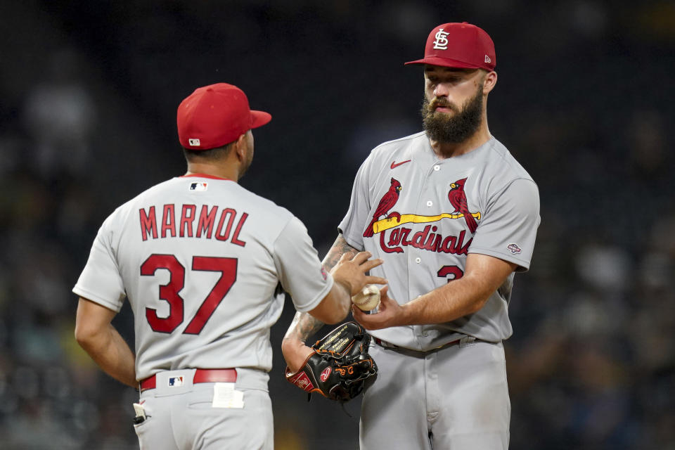 St. Louis Cardinals manager Oliver Marmol takes starting pitcher Drew Rom out of the game after he gave up a three-run home run to Pittsburgh Pirates' Joshua Palacios in the fourth inning of a baseball game in Pittsburgh, Monday, Aug. 21, 2023. (AP Photo/Matt Freed)