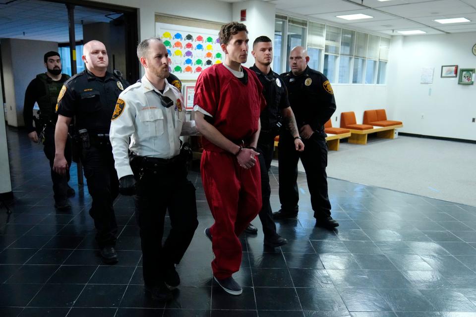 Bryan Kohberger, who is accused of killing four University of Idaho students, leaves after an extradition hearing at the Monroe County Courthouse in Stroudsburg, Pa., Tuesday, Jan. 3, 2023. (AP Photo/Matt Rourke, Pool)