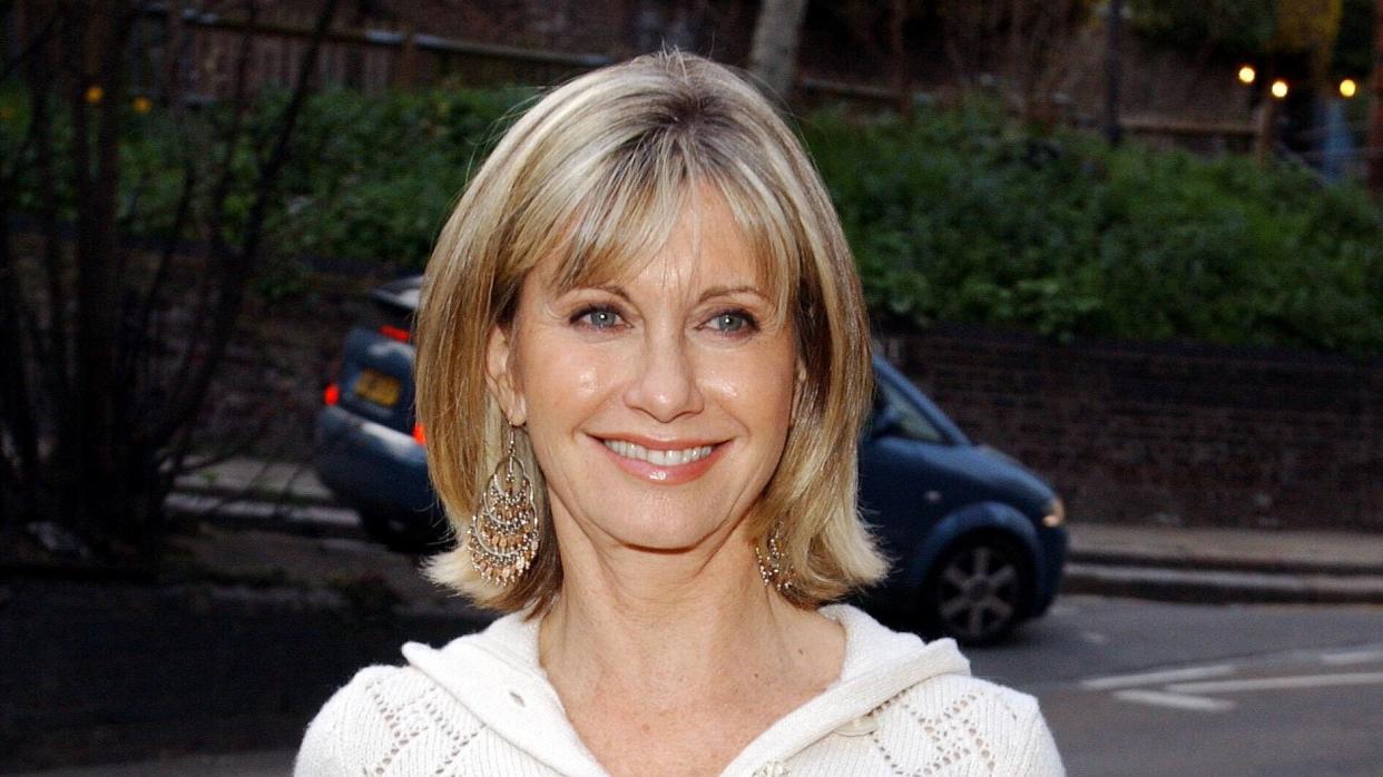 Olivia Newton-John claims she’s visited by the ghosts of her famous friends