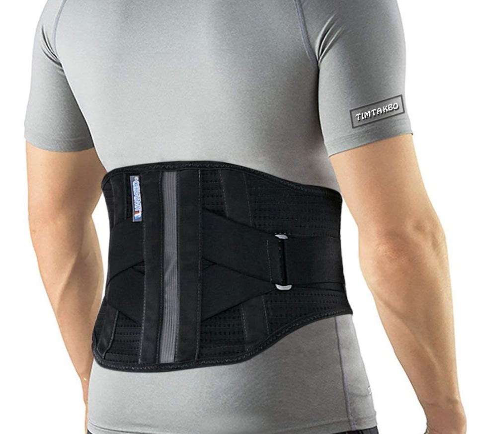 man in grey t-shirt wearing black Lower Back Brace with Removable Lumbar Pad (Photo via Amazon)