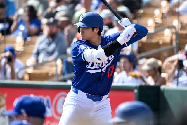 <p>David Durochik/Diamond Images via Getty</p> Ohtani at the Dodgers game against the Chicago White Sox in Feb. 2024