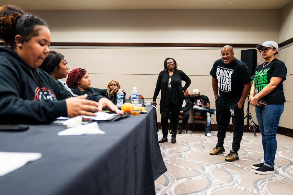 Black Voters Matter co-founder Cliff Albright speaks with college students after an instructional session on canvassing techniques in North Charleston, S.C., on Thursday, Jan. 25, 2024.