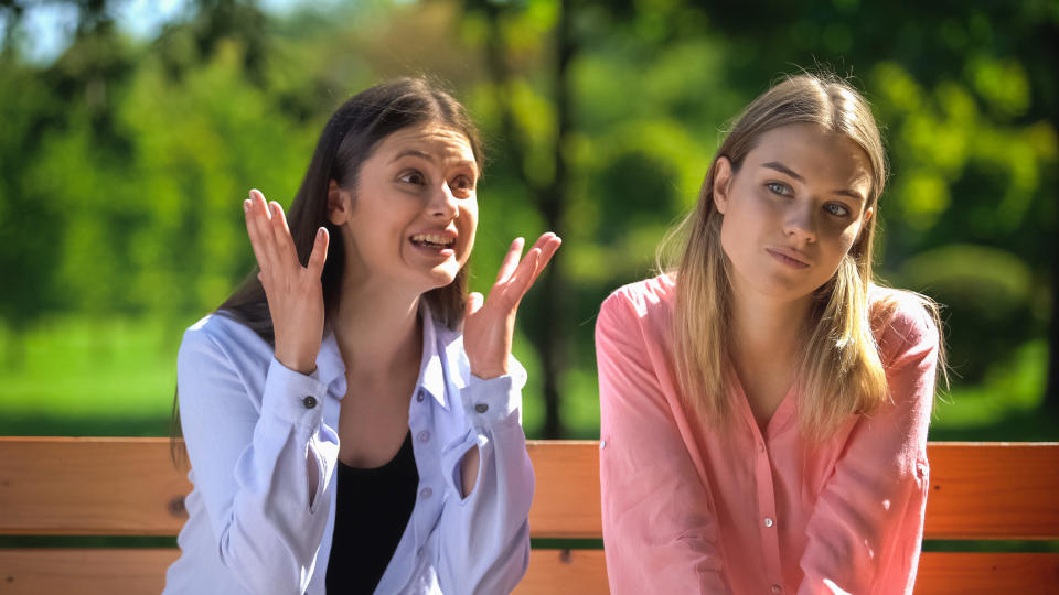 Woman talking to another woman in an annoying manner