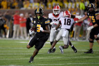 Missouri wide receiver Luther Burden III runs with the ball after a catch during the first half of an NCAA college football game against Georgia Saturday, Oct. 1, 2022, in Columbia, Mo. (AP Photo/L.G. Patterson)