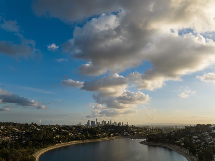 LOS ANGELES, CA - DECEMBER 06: Clouds move through Los Angeles, as seen from the Silver Lake Reservoir, bringing a chance of evening rain. Photographed on Tuesday, Dec. 6, 2022 in Los Angeles, CA. (Myung J. Chun / Los Angeles Times)