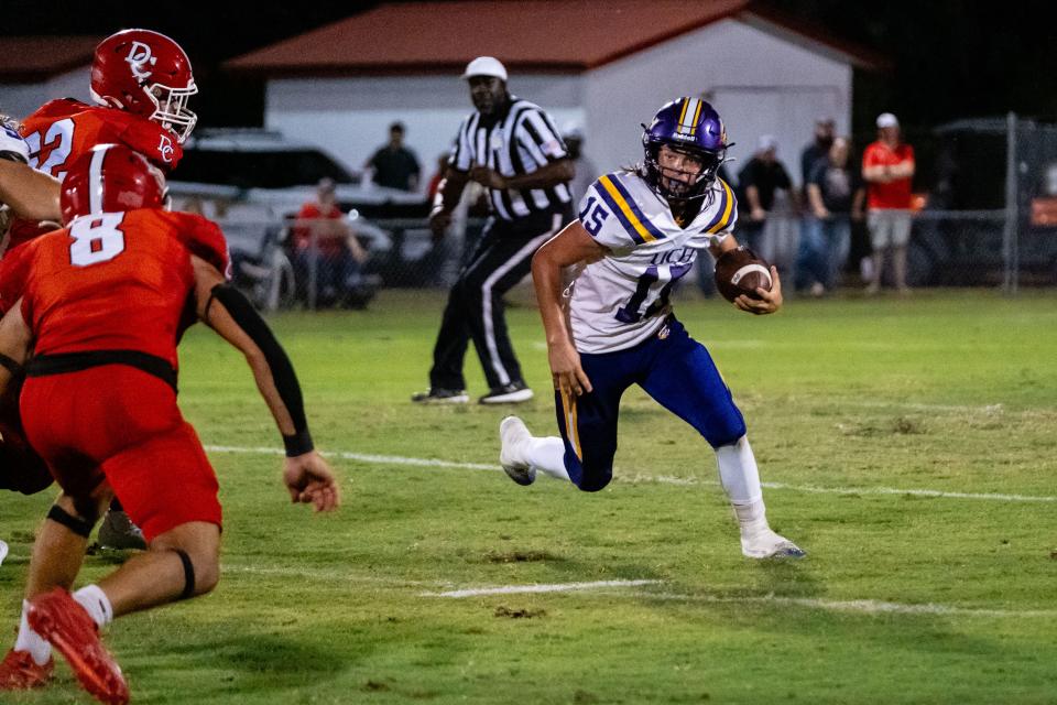 Union County Fightin' Tigers Trenton Klein (15) runs with the ball during the first half at Dixie County High School in Cross City, FL on Thursday, October 26, 2023. [Chris Watkins/Gainesville Sun]