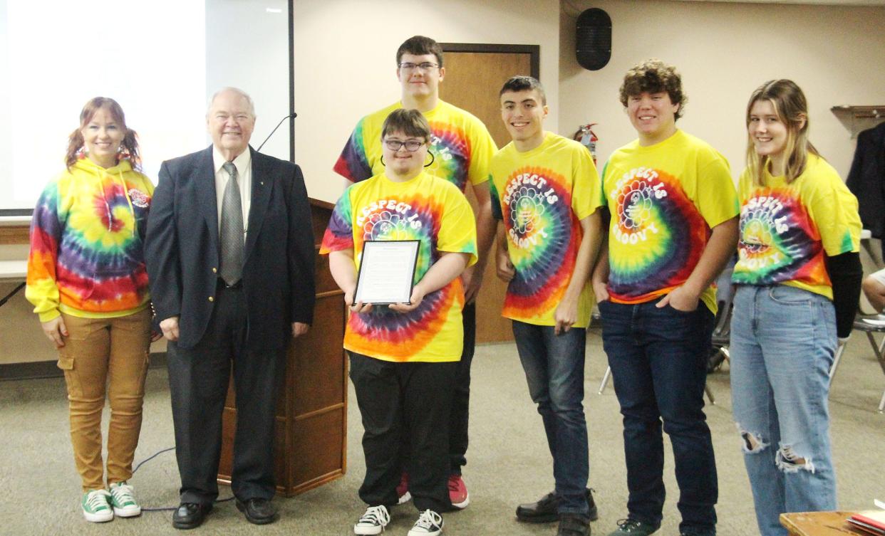 Bill Alvey, second from left, stands with Laura Baumgardner, left, and members of the Peers in Action group of Pontiac Township High School after proclaiming Feb. 27-March 5 as "Spread the Word Inclusion Respect Week" in Pontiac. This was at Monday's city council meeting at city hall.