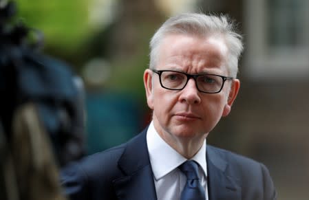 Britain's Chancellor of the Duchy of Lancaster Michael Gove appears to make a statement at Downing Street in London