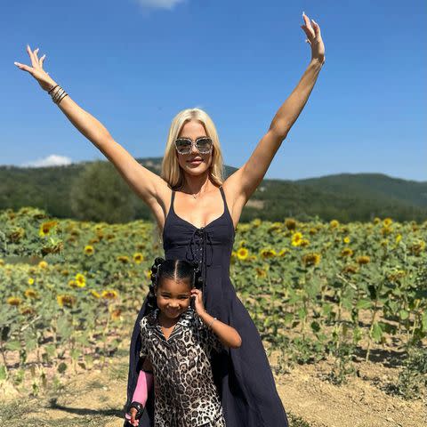 <p>Khloe Kardashian/Instagram</p> Kardashian and daughter True visited a sunflower field on vacation in Italy