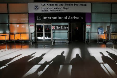 FILE PHOTO: An international traveler arrives after U.S. President Donald Trump's executive order travel ban at Logan Airport in Boston, Massachusetts, U.S. January 30, 2017. REUTERS/Brian Snyder