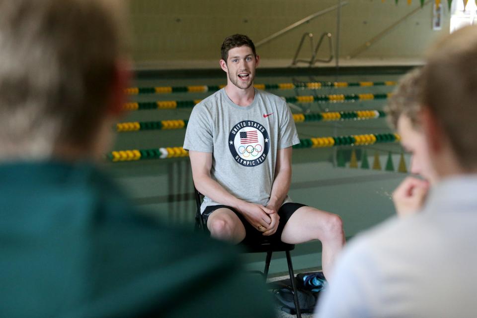 Olympic gold medalist Hunter Armstrong answers questions for youth  swimmers at the Massillon YMCA.