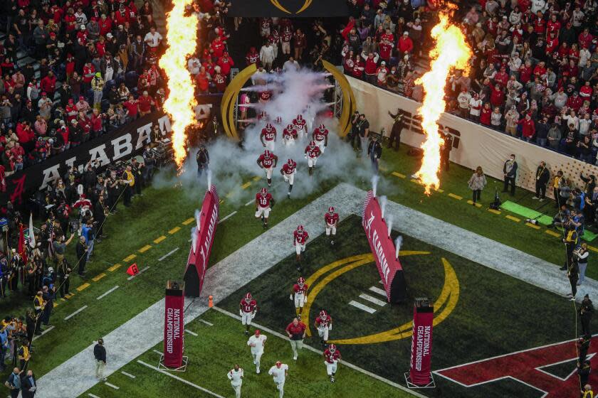 Alabama players are introduced before the College Football Playoff championship football game.