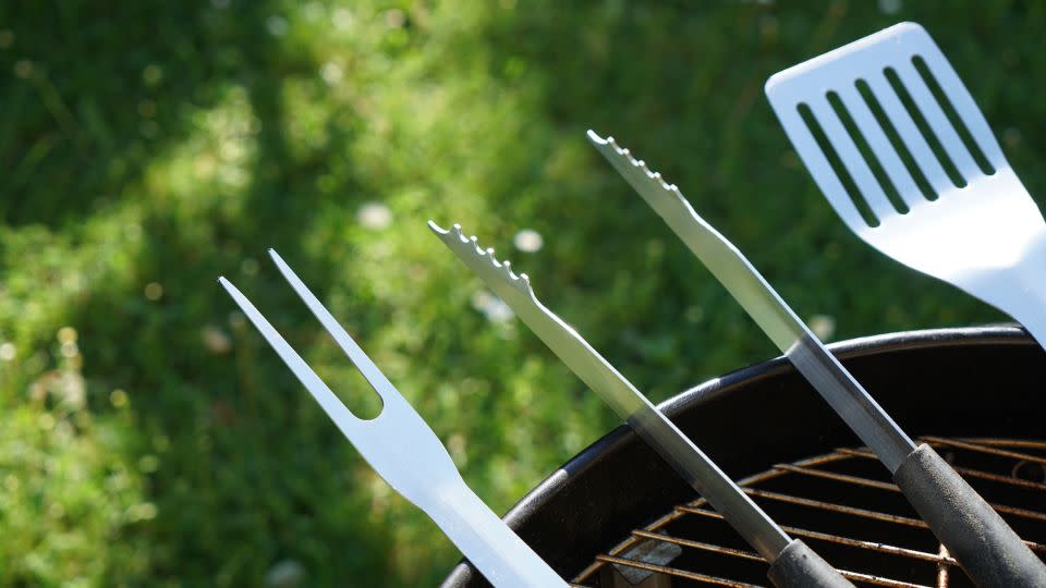 Be mindful of using cooking tools that can withstand high heat. Metal cutlery are staples of outdoor cooking. - Helmut Feil/iStockphoto/Getty Images