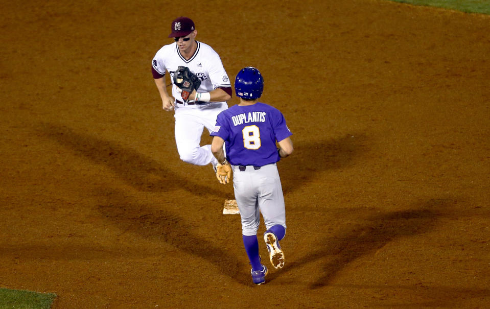 Mississippi State shortstop Jordan Westburg (11) gets the force out on LSU's Antoine Duplantis (8) during the fifth inning of a Southeastern Conference tournament NCAA college baseball game Wednesday, May 22, 2019, in Hoover, Ala. (AP Photo/Butch Dill)