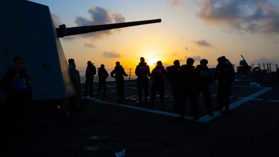 The men and women of the Navy destroyer Mason are one of several that have shot down scores of Iran-backed Houthi rebel attack drones and missiles over the Red Sea in recent months. The crew is shown here during an at-sea replenishment on Dec. 21. (Mass Communication Specialist 1st Class Chris Krucke/Navy)