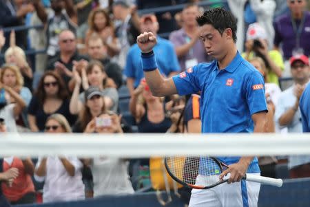 Sep 1, 2016; New York, NY, USA; Kei Nishikori of Japan celebrates after defeating Karen Khachanov of Russia (not pictured) on day four of the 2016 U.S. Open tennis tournament at USTA Billie Jean King National Tennis Center. Anthony Gruppuso-USA TODAY Sports