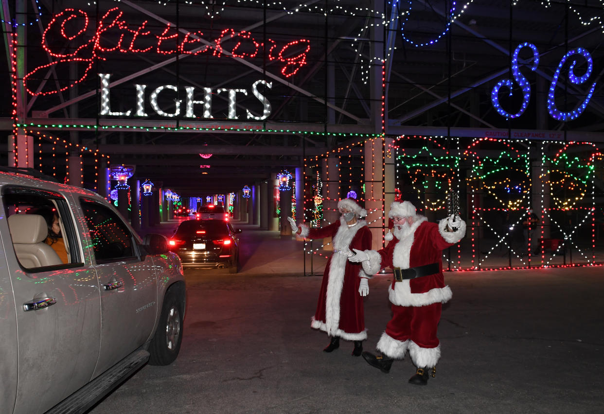 Viewing Christmas lights at a drive-through display — such as this year's Glittering Lights at the Las Vegas Motor Speedway, is a generally safe holiday activity this year. (Photo: Ethan Miller/Getty Images)