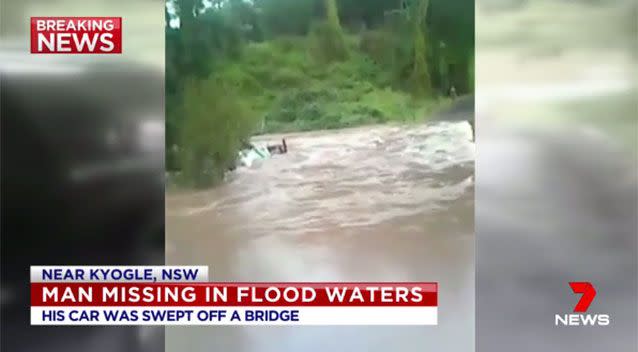 The man's car was swept off a bridge in NSW. Source: 7News