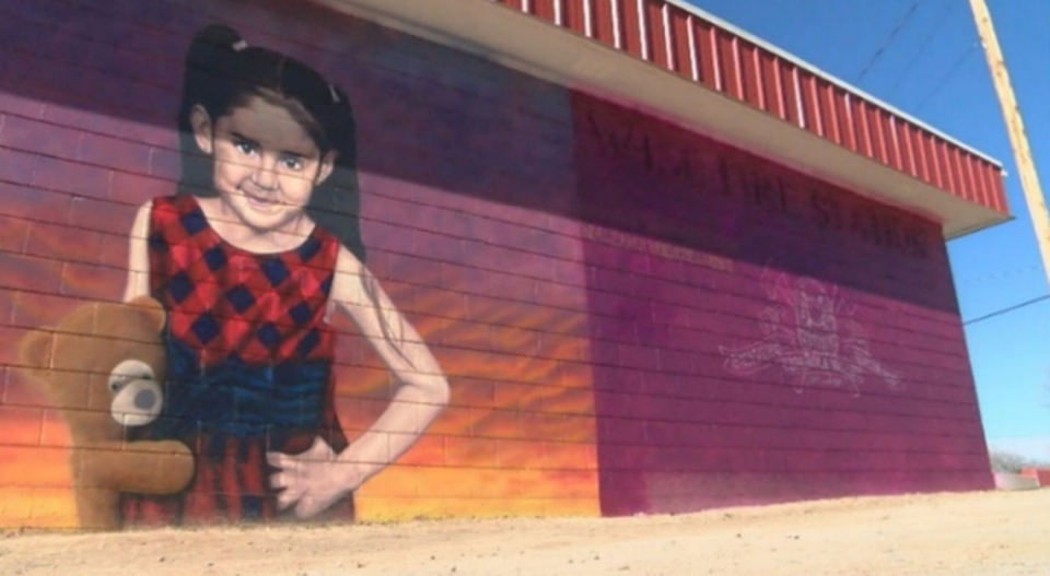 Mural of Renezmae and Mister Bear.