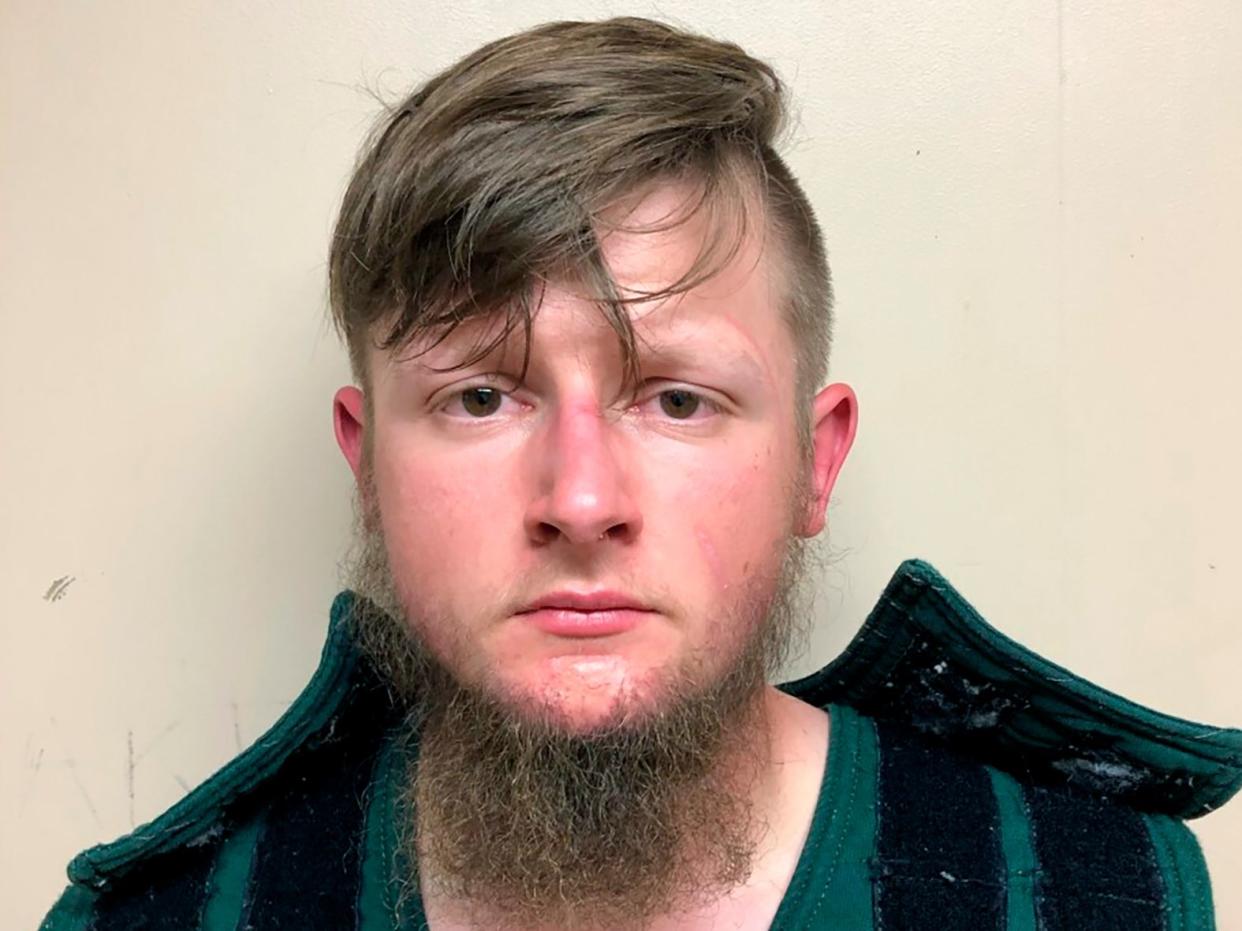 This booking photo provided by the Crisp County Sheriff's Office shows Robert Aaron Long on Tuesday, March 16, 2021. Long was arrested in the killings of multiple people at three Atlanta-area massage parlors, most of them women of Asian descent, authorities said.  (Crisp County Sheriff's Office via AP)