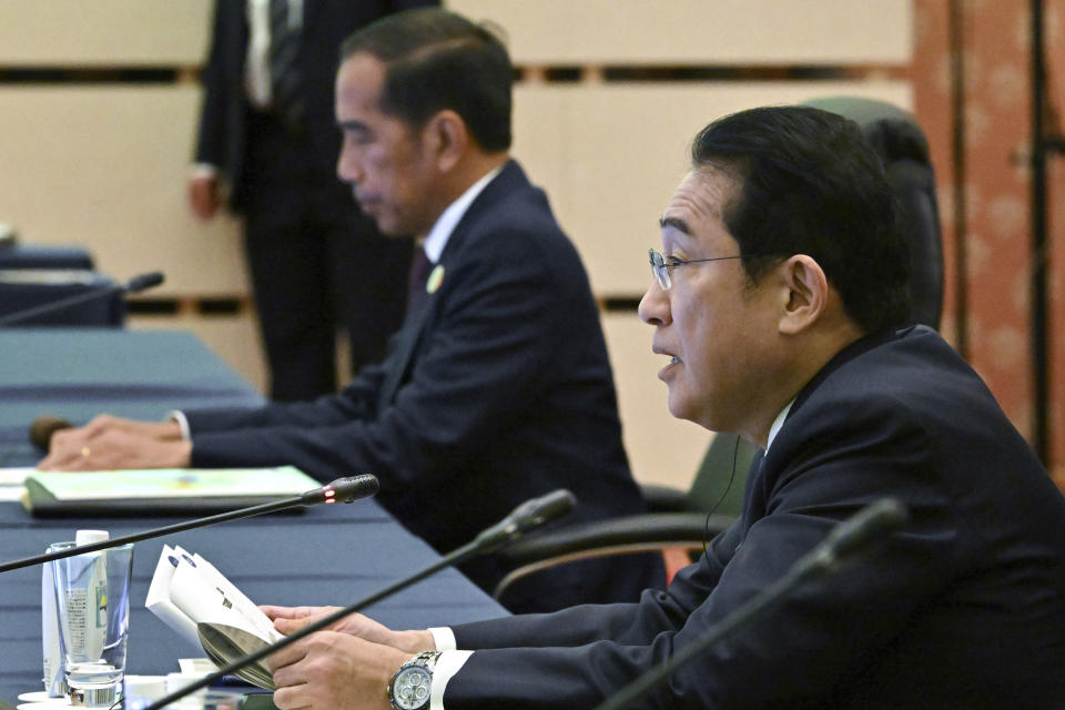 Japan's Prime Minister Fumio Kishida, bottom, speaks during a session of the ASEAN-Japan Commemorative Summit Meeting at the Hotel Okura Tokyo in Tokyo Sunday, Dec. 17, 2023. (Kazuhiro Nogi/Pool Photo via AP)