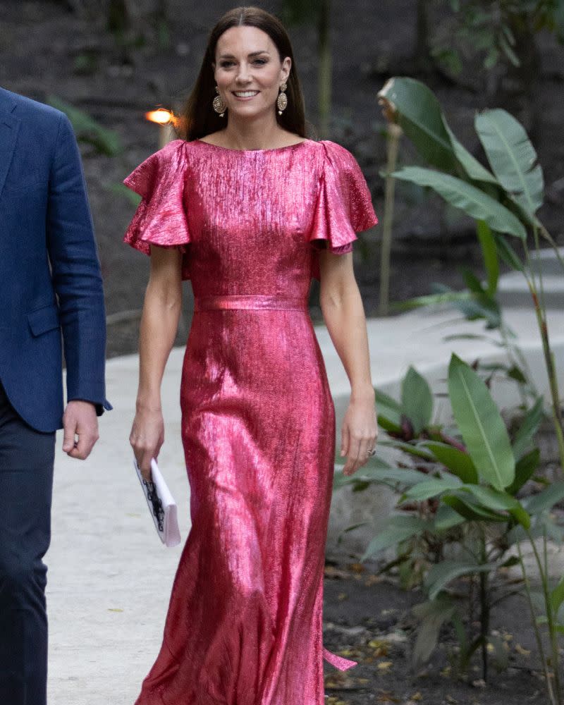 <p> Worn during a visit to Belize, this glittery Barbiecore gown is a real showstopper for Kate Middleton. From the statement sleeves to the maxi cut, this is a look we love. </p>
