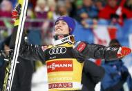 Ski Jumping - 65th four-hills ski jumping tournament final round - Bischofshofen, Austria - 06/01/2017 - Norway's Daniel Andre Tande celebrates third place in the 65th four-hills tournament. REUTERS/Dominic Ebenbichler