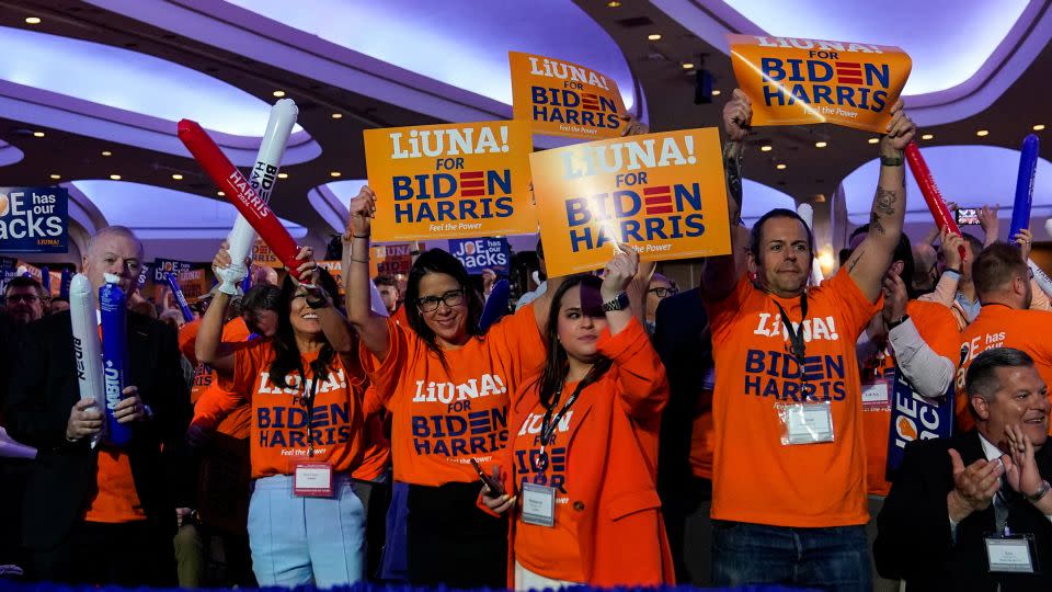 People chant before President Joe Biden delivers his remarks at a conference held by the North America's Building Trades Unions at the Washington Hilton, in Washington, DC, on April 24. - Elizabeth Frantz/Reuters