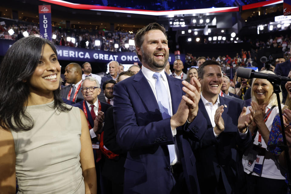  U.S. Sen. J.D. Vance, R-Ohio, and his wife, Usha Chilukuri Vance, celebrate as he is nominated for the office of Vice President alongside Ohio Delegate Bernie Moreno on the first day of the Republican National Convention at the Fiserv Forum on July 15, 2024 in Milwaukee, Wisconsin. (Photo by Anna Moneymaker/Getty Images)