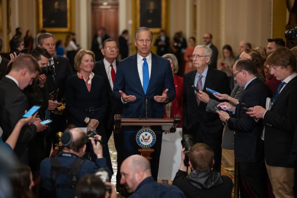 Senator John Thune, a Republican from South Dakota, center, speaks during a news conference following the weekly Republican caucus luncheon at the U.S. Capitol in Washington, D.C. on Feb. 27, 2024. (Craig Hudson/Bloomberg via Getty Images)