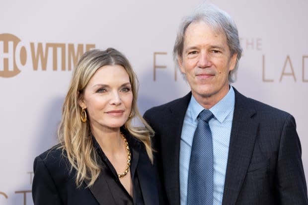 Michelle Pfeiffer and David E. Kelley arrive at Showtime's FYC event and premiere for "The First Lady" at DGA Theater Complex on <a href="https://parade.com/1360954/jessicasager/april-holidays-observances/" rel="nofollow noopener" target="_blank" data-ylk="slk:April;elm:context_link;itc:0;sec:content-canvas" class="link ">April</a> 14, 2022, in Los Angeles.<p><a href="https://www.gettyimages.com/detail/1391542856" rel="nofollow noopener" target="_blank" data-ylk="slk:Emma McIntyre/Getty Images;elm:context_link;itc:0;sec:content-canvas" class="link ">Emma McIntyre/Getty Images</a></p>