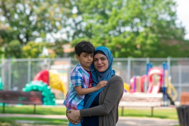 Amal Battrawi and her five-year-old son, Sameer, have been separated from the rest of their family since mid-2019 after fleeing Gaza. (Bobby Hristova/CBC - image credit)