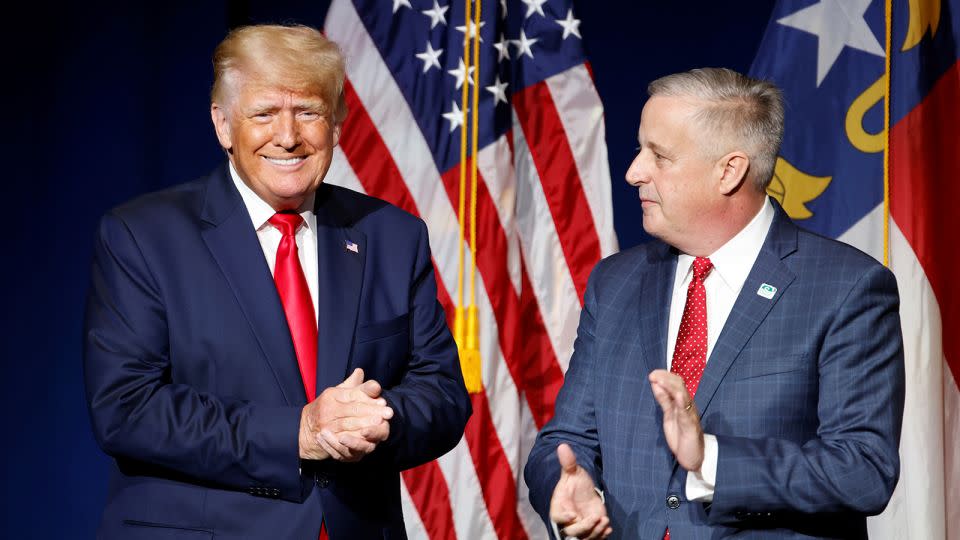 Former President Donald Trump is introduced by North Carolina Republican Party chairman Michael Whatley before speaking at the state GOP convention dinner in Greenville, North Carolina, in June 2021. - Jonathan Drake/Reuters/File