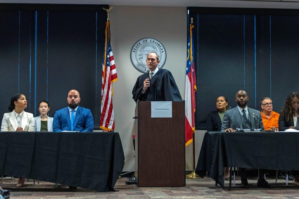 Fulton Superior Court Judge Scott McAfee addresses potential jurors during jury selection for lawyer Kenneth Chesebro's trial, Friday, Oct. 20, 2023, at the Fulton County Courthouse in Atlanta. Jury selection began Friday for Chesebro, the first defendant to go to trial in the Georgia case that accuses former President Donald Trump and others of illegally scheming to overturn the 2020 election in the state. (Alyssa Pointer/Pool Photo via AP)