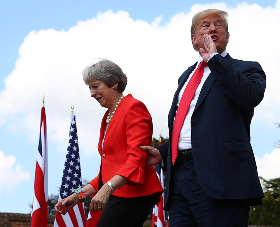 <p>Britain’s Prime Minister Theresa May and President Donald Trump walk away after holding a joint news conference at Chequers, the official country residence of the Prime Minister, near Aylesbury, Britain, July 13, 2018. (Photo: Hannah McKay/Reuters) </p>