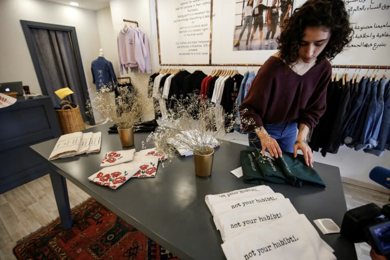 The clothes of Yasmeen Mjalli's BabyFist label carry messages in English and Arabic aimed at helping empower Palestinian women